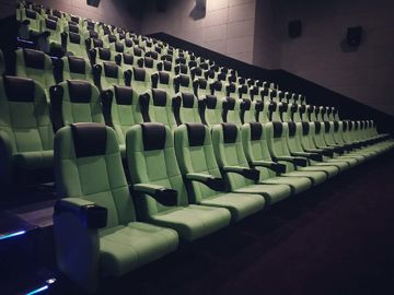 VIP Lounge Commercial Theater Seating Iron Legs Thick Steel Stucture  With Cup Holder